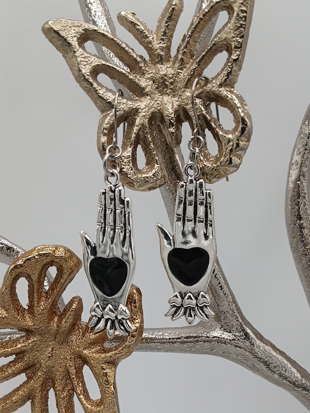 Silver Hand Earrings with Black Heart Accent